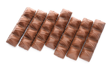 Many tasty chocolate bars isolated on white, top view