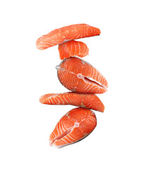 Cut fresh salmon falling on white background