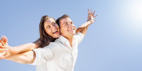 Happy beautiful couple on beach. Have fun concept