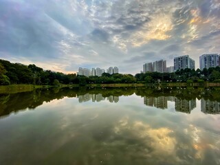 Fototapeta na wymiar Reflection of housing estates near Punggol Park
