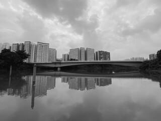 Reflection of housing estate at Sengkang Riverside Park