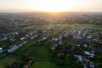 Aerial view of the Canggu area, one of the Bali beachside areas experiencing massive development. The conversion of agricultural land into an entertainment center and housing.