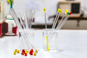 Yellow and colorless sample solutions were prepared in the NMR glass tubes and placed in a beaker...
