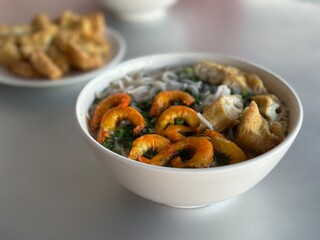 asian soup, street food with shrimp and noodles, tofu 