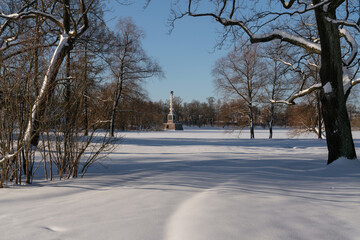 The Chesmenskaya Column in the Catherine Park in Tsarskoye Selo on a sunny winter day, Pushkin, St....