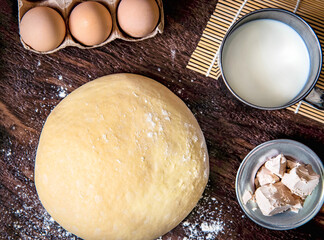 Fresh raw dough and ingredients for making dough