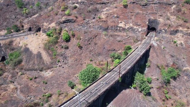 Aerial view of a railway viaduct on the Bhor Ghats near Khopoli India.