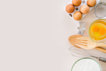 Frame of baking and cooking bread pastry or cake ingredients and cooking utensils , flour milk...