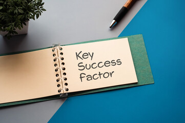 There is notebook with the word Key Success Factor. It is an eye-catching image.