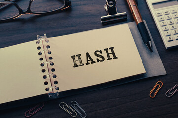 There is note book with the word Hash on a laptop. It is an eye-catching image. © hogehoge511