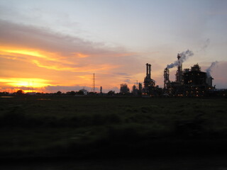 Oil refinery at sunset in the countryside of Cilegon, Indonesia. Oil and gas industry.