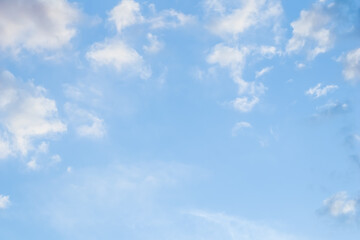 Background of blue sky with white clouds