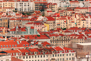 Fototapeta na wymiar Aerial panoramic view of downtown of Lisbon, Portugal. Drone photo of the Lisbon old town skyline. Historical district Alfama at sunrise in capital city of Portugal