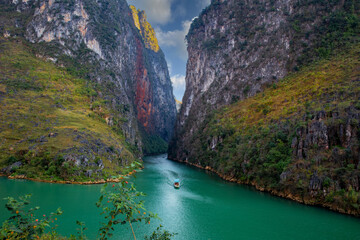 The alley of the Nho Que river. A famous river located in Ha Giang Vietnam is jade green