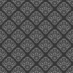 Seamless vector gray background ornate decorative leaves in art deco style.