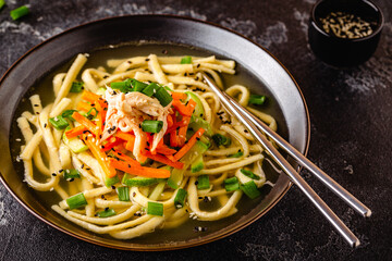 Traditional Korean chicken soup with homemade noodles