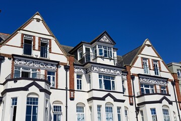 Fototapeta na wymiar Traditional whitewashed building along the promenade, Sidmouth, Devon, UK, Europe.