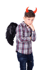 Little boy with a devil costume - 592867168