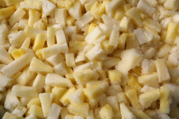 frosted pieces of pineapple background close up photo 