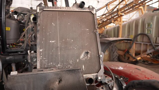 Farm machinery was mutilated after a rocket hit a warehouse