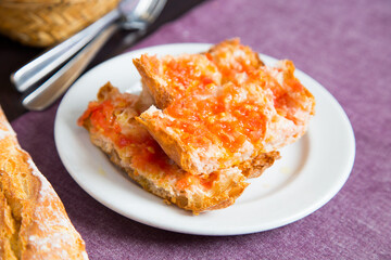 Toasted bread with tomato and oil. Traditional Spanish tapa.