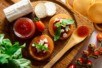 Pancakes with goat cheese and tomato jam.