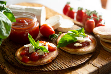 Pancakes with goat cheese and tomato jam.