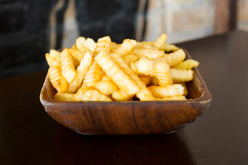 French Fries are potatoes that are made by cutting them into batons and frying them in hot oil until golden brown and crisp.