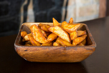 French Fries are potatoes that are made by cutting them into batons and frying them in hot oil until golden brown and crisp.