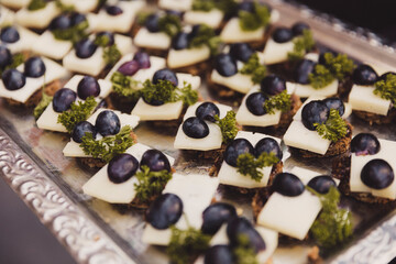 Appetizers on a silver tray.