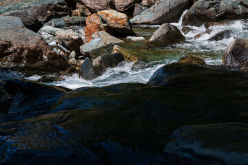 Fototapeta na wymiar Le bellissime cascate di Lillaz in Valle d'Aosta all'interno del Parco Nazionale del Gran Paradis