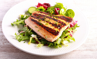 salmon fillet with salad