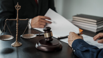 Lawyers and clients discuss the rights and liberty of children and women.