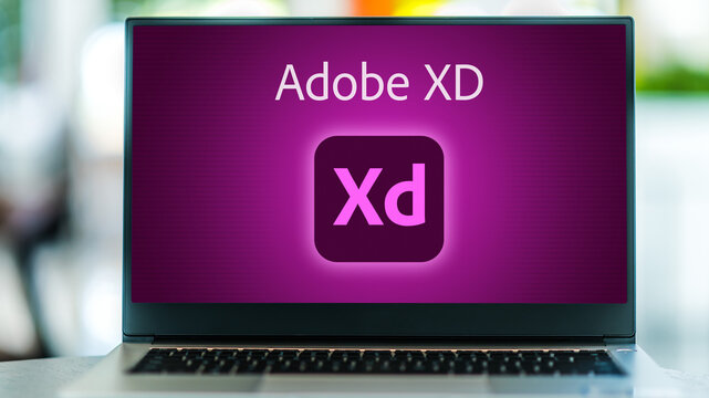 Laptop computer displaying logo of Adobe XD