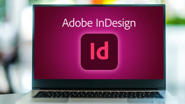Laptop computer displaying logo of Adobe InDesign