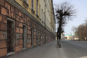 The old factory building on Cathedral Street in the city of Ryazan. The building opposite the square near the Ryazan Kremlin