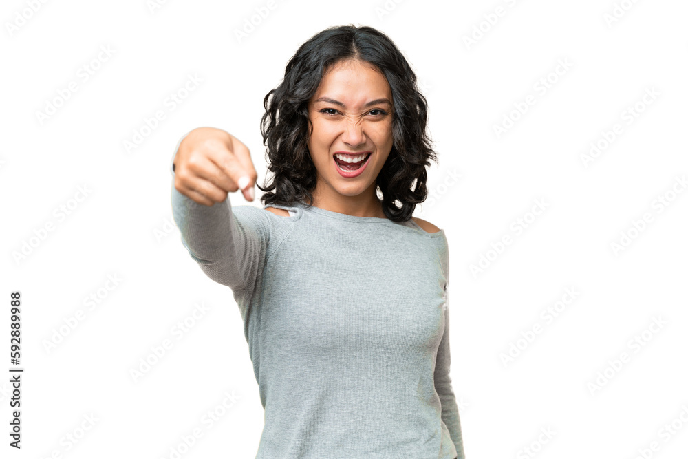 Wall mural Young Argentinian woman over isolated background frustrated and pointing to the front