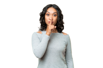Young Argentinian woman over isolated background showing a sign of silence gesture putting finger in mouth