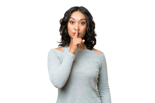 Young Argentinian woman over isolated background showing a sign of silence gesture putting finger in mouth