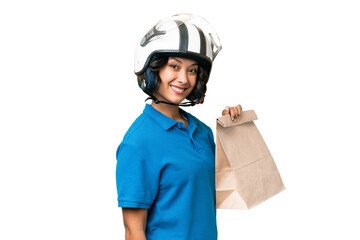 Young Argentinian woman taking a bag of takeaway food over isolated background smiling a lot