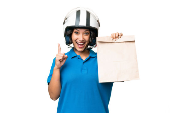 Young Argentinian woman taking a bag of takeaway food over isolated background pointing up a great idea