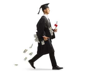 Full length profile shot of a male graduate student walking and carrying a case with money for a...