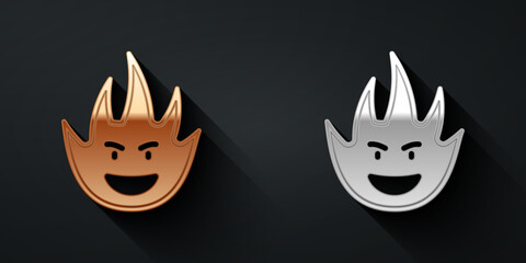 Gold and silver Fire flame icon isolated on black background. Long shadow style. Vector