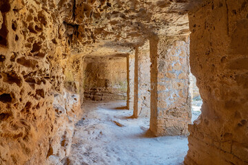 Obraz premium Republic of Cyprus. Paphos attractions. Archaeological park. City of ancient civilizations. Holidays in Cyprus. Travel to city of Paphos. Fragment of ancient building with columns. Cyprus island