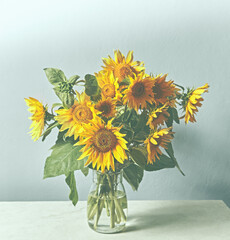 Bouquet of beautiful sunflowers in a vase © B.G. Photography