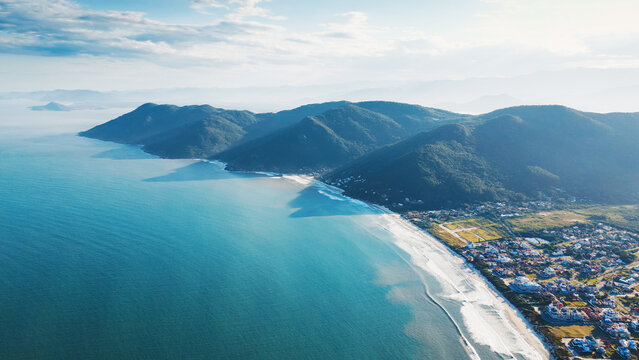 Aerial view of the Brazilian coastline with mountains near the town of Acores, on the island of Santa Catarina, Brazil