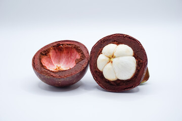 Close-up of mangosteen with white background.