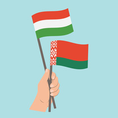 Flags of Hungary and Belarus, Hand Holding flags