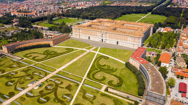 Aerial view of the Royal Palace of Caserta also known as Reggia di Caserta. It is a former royal residence with large gardens in Caserta, near Naples, Italy. It is the main facade of the building.