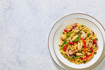 chicken mushroom paella with pepper, green peas